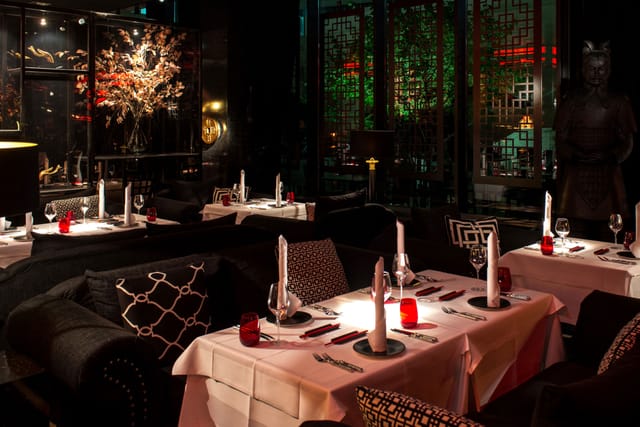 Private dining room at Zenzakan featuring plush lounge seating for corporate dinners and VIP events.