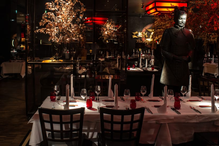 Private dining room at Zenzakan with dramatic lighting for corporate dinners and VIP events.