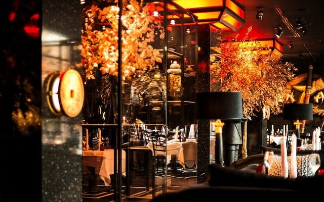 Luxury Zenzakan restaurant with gold décor for upscale corporate dinners and VIP receptions.