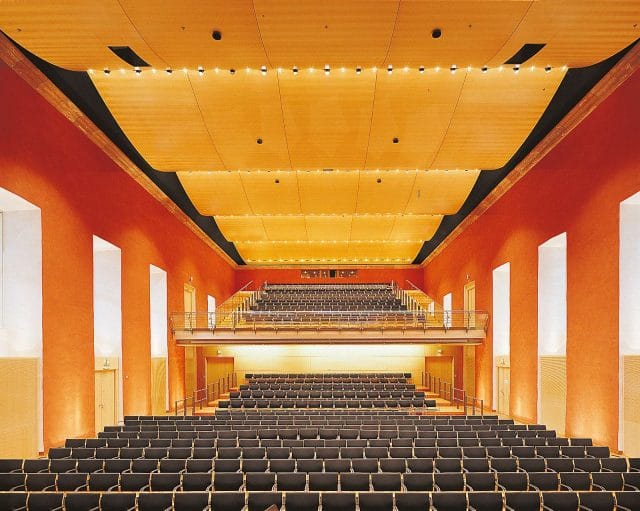 Comoedienhaus auditorium with tiered seating for corporate presentations and award ceremonies.