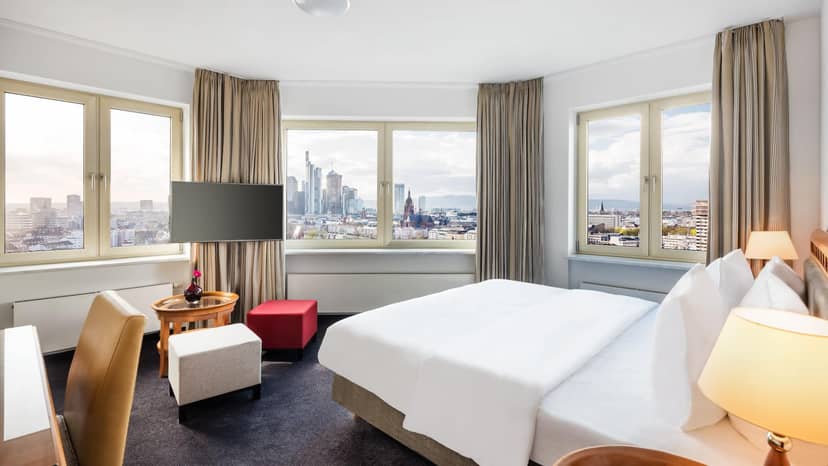 Premium guest room with skyline view for VIP conference delegates and speakers.
