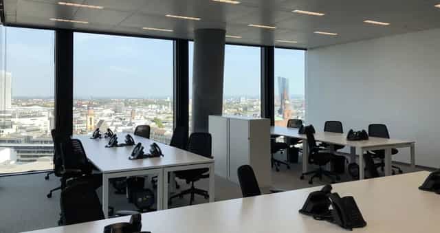 Modern private office with city views for high-level corporate meetings and professional boardrooms.
