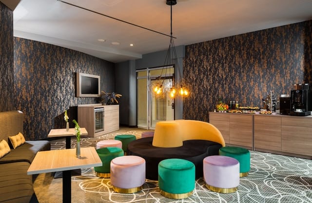 Modern breakout space with modular seating for networking and corporate events.