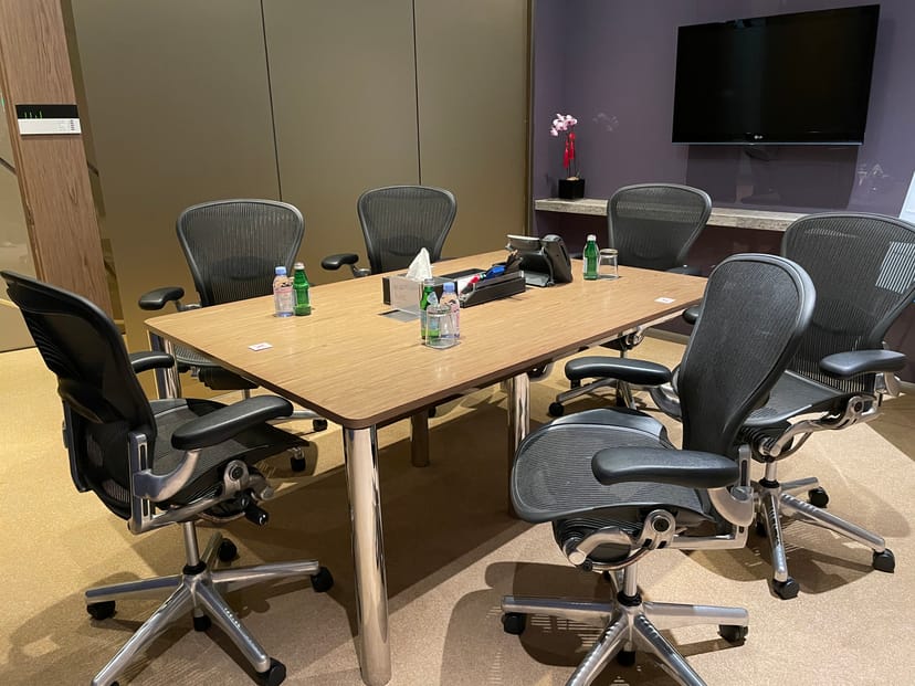 Boardroom in Ocean Financial Centre with ergonomic chairs for corporate meetings and collaboration.