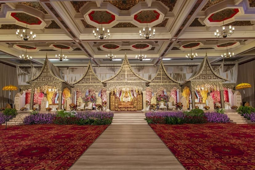 Ornate traditional stage at Balai Sudirman ballroom for luxury wedding event.