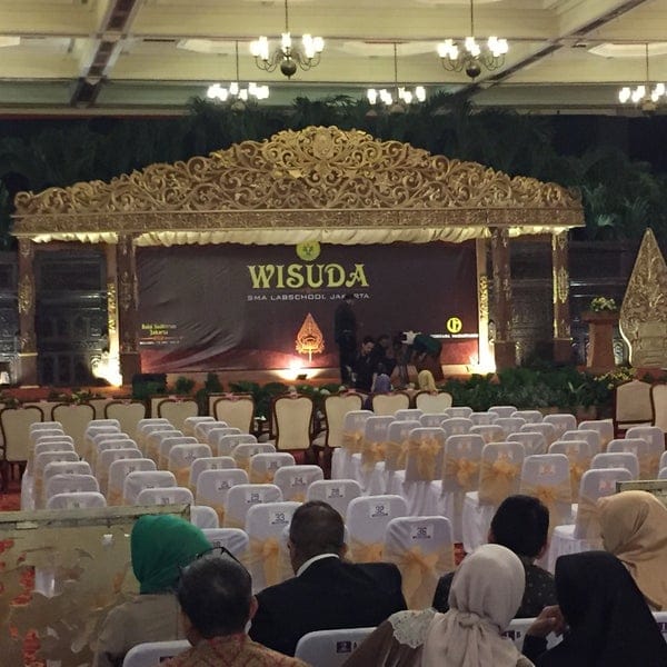Panti Prajurit Balai Sudirman graduation ceremony setup with ornate Javanese backdrop.