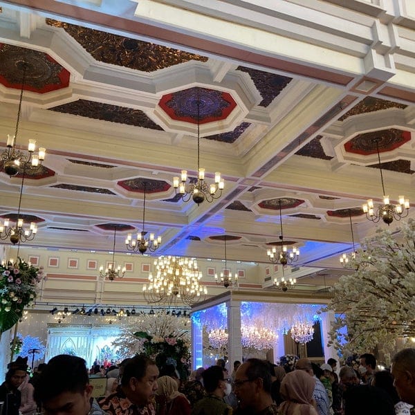 Panti Prajurit ballroom with ornate chandeliers for luxury wedding and corporate event venue.