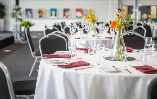 Banquet setup in Rosalind Franklin Room at We the Curious for corporate events and luncheons.