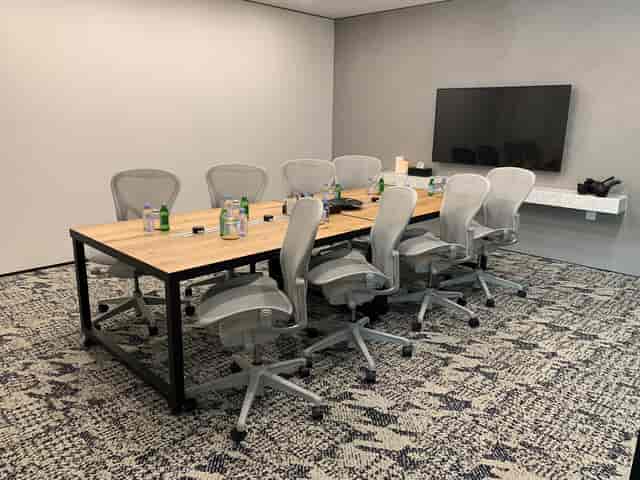 Boardroom meeting room with ergonomic chairs for strategy sessions and hybrid events.