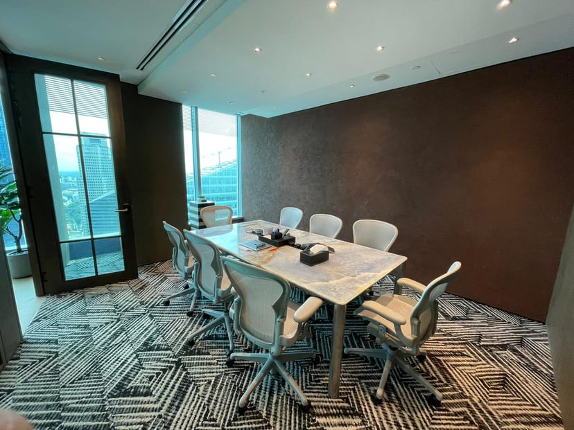 Executive boardroom with floor-to-ceiling windows for private meetings and corporate briefings.