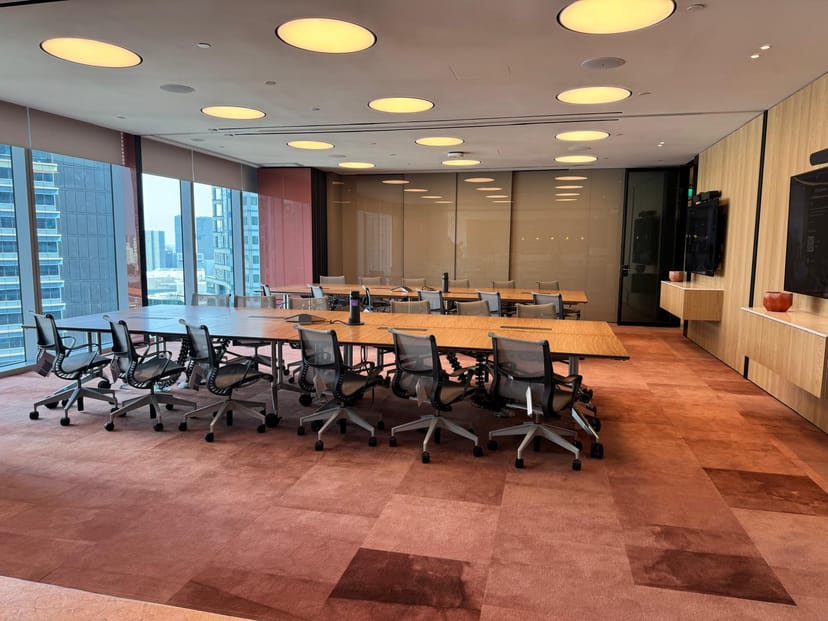Corporate boardroom at Ocean Financial Centre with natural light for professional business meetings.