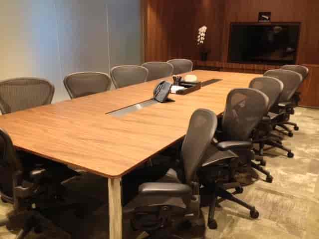 Modern boardroom at Six Battery Road with ergonomic seating for corporate meetings and events.