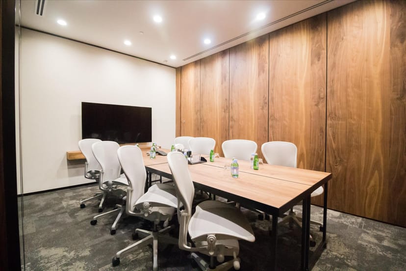 Boardroom setup in Fraser Tower meeting room 17D for corporate collaboration and breakout sessions.