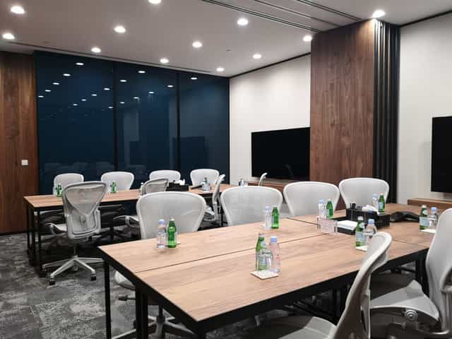 Modern boardroom in Fraser Tower with ergonomic seating for corporate meetings and conferences.