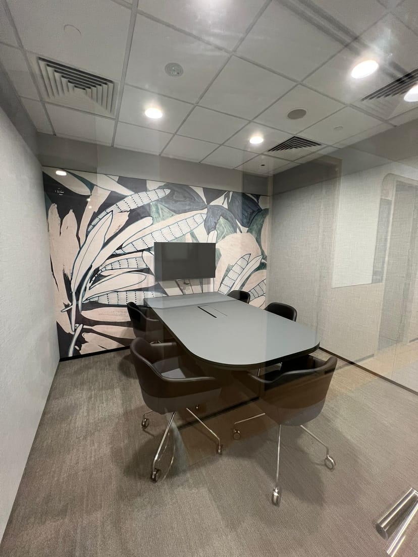 Huddle room 5C, Singapore Land Tower with AV setup for corporate meetings and team collaboration.