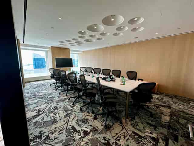 Modern executive boardroom in Singapore Land Tower for private negotiations and strategy sessions.