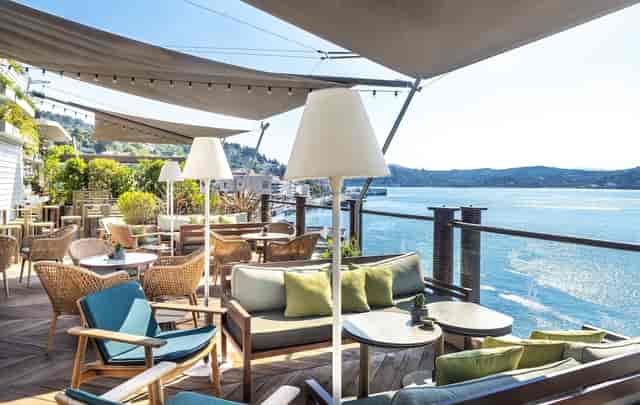 Bebek Hotel waterfront bar with lounge seating for outdoor cocktail events and VIP networking.