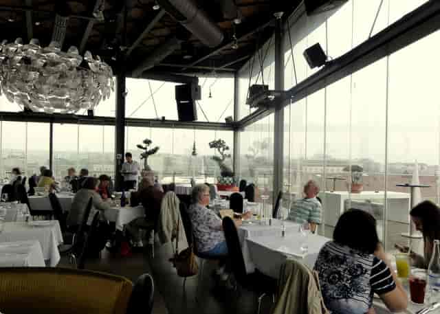 360 Istanbul restaurant venue with floor-to-ceiling windows for corporate events and networking.