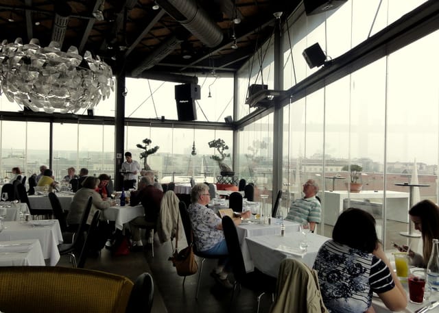 360 Istanbul restaurant venue with floor-to-ceiling windows for corporate events and networking.