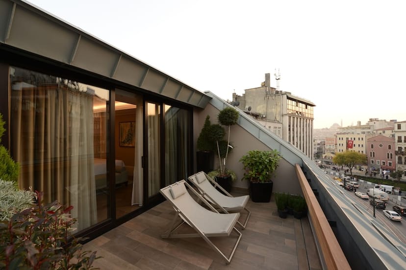 Rooftop Terrace Suite with private balcony for executive retreats and VIP networking events.
