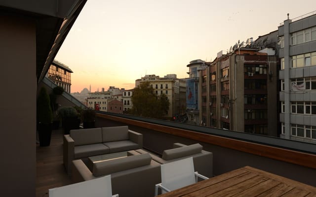 Rooftop Terrace Suite with city views for premium cocktail events and networking.