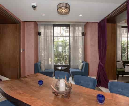Kupaj Lounge private board meeting space with natural light for professional corporate events.