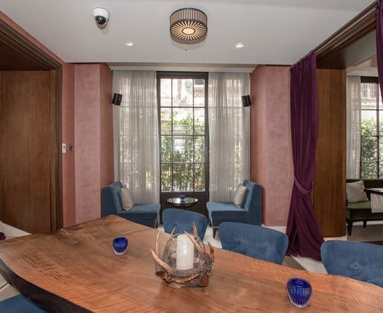Kupaj Lounge private board meeting space with natural light for professional corporate events.