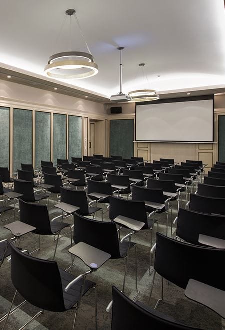Balikli Meeting Room at 10 Karaköy: Boardroom setup with projector for professional workshops.