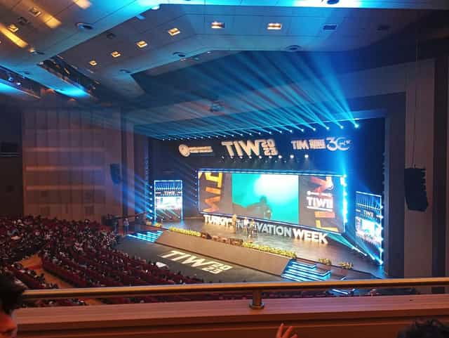 Sadabad Auditorium stage with architectural lighting for corporate events and conferences.