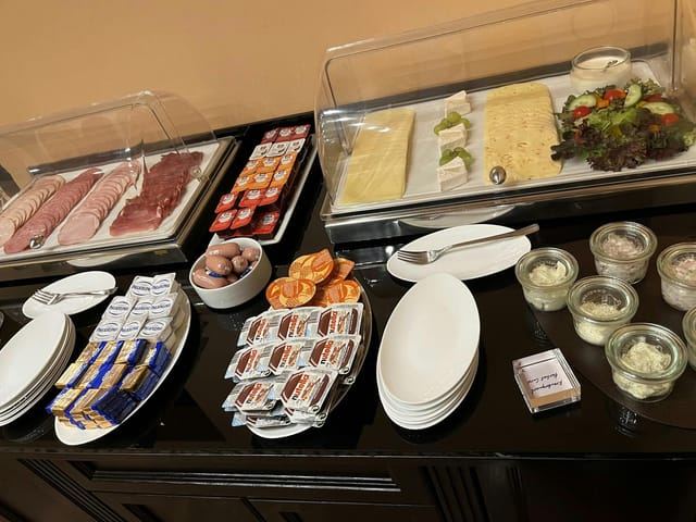 Hotel Concorde continental breakfast buffet spread for hotel catering and event planning.