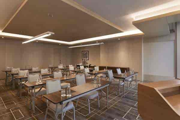 Classroom-style breakout room at Wyndham Grand Istanbul for corporate training or planning events.