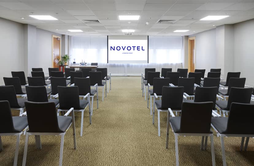 Modern meeting room at Novotel London West, ideal for corporate events and workshops.