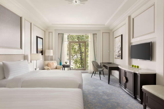 Double-queen guest room at Shangri-La Bosphorus Istanbul, perfect for luxury group event lodging.