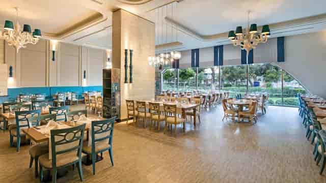 Pacific Main Saloon event space with teal accents for corporate lunches and social mixers.