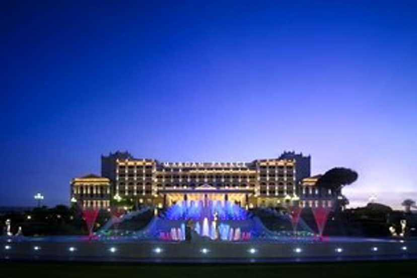 Luxury gala venue at Titanic Hotels with dramatic lighting and fountain for corporate events.