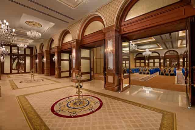 Grand ballroom foyer with elegant arches at Titanic Hotels for corporate conferences and galas.