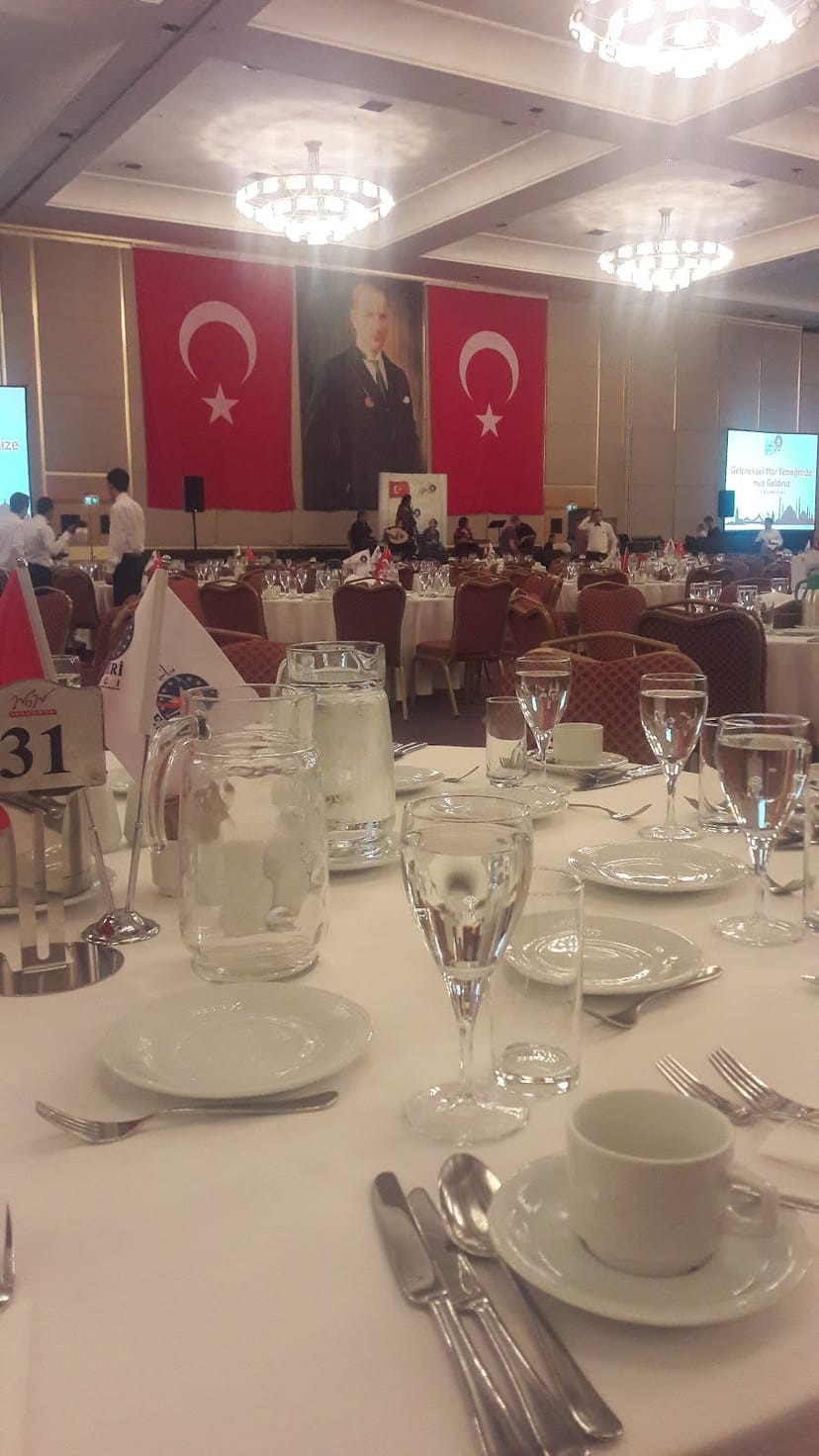 Gala dinner setup at WOW Group Hotels ballroom for corporate events and formal conferences.