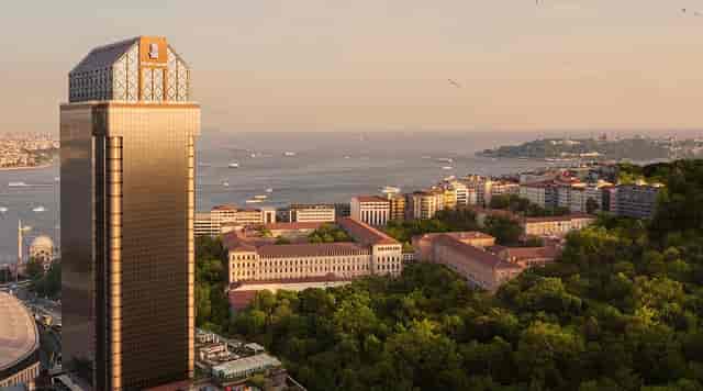Luxury Ritz-Carlton Istanbul suite with waterfront view for executive corporate events.