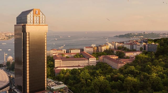 Luxury Ritz-Carlton Istanbul suite with waterfront view for executive corporate events.