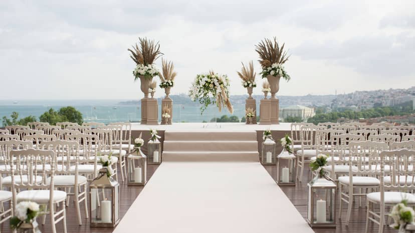Outdoor wedding ceremony setup at Hilton Istanbul Bosphorus with elegant floral decor.
