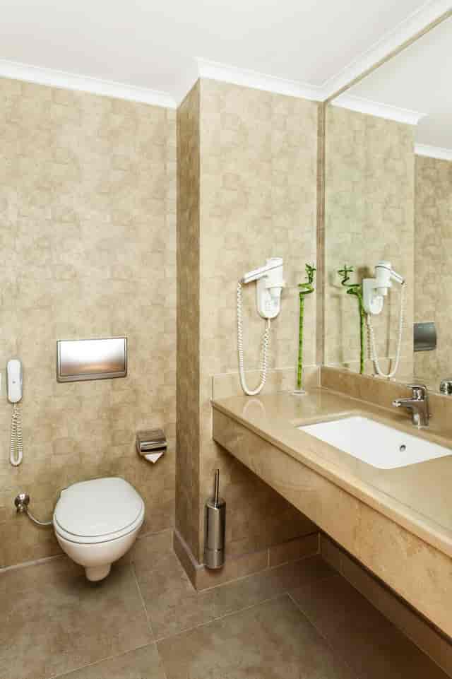 Zeus hotel bathroom at WOW İstanbul; dated decor for corporate RFP and room block audit planning.