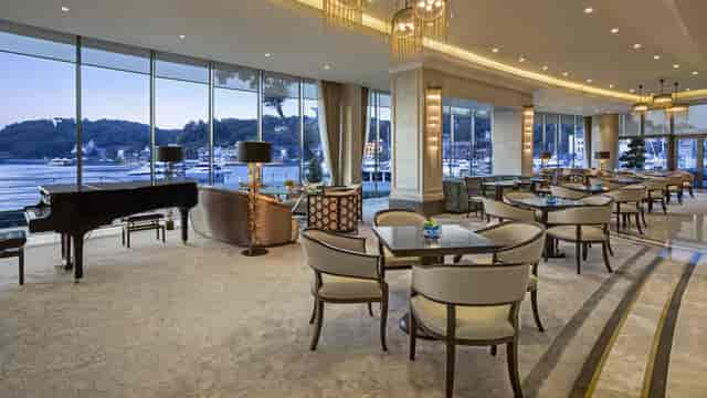 Upscale waterfront lounge at The Grand Tarabya Hotel for networking and cocktail events.