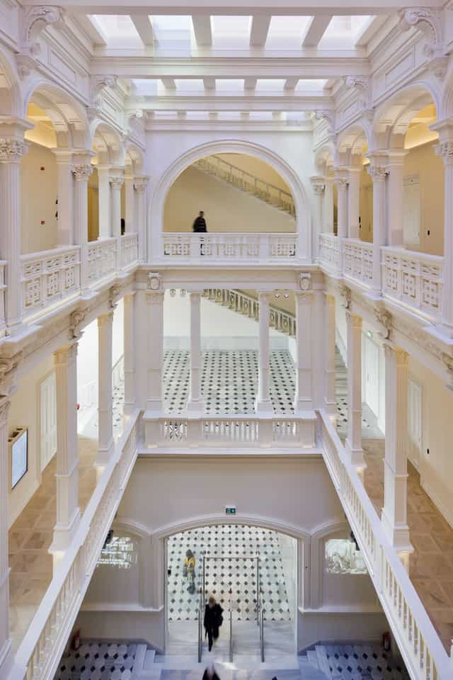 Multi-level atrium at Salt Beyoğlu: Elegant venue for high-end corporate gala and brand reception.