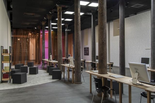 Industrial-chic FORUM venue in Salt Beyoğlu with modular seating for workshops and co-working.