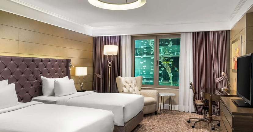 Upscale Radisson Blu Istanbul Sisli conference room with modern workspace for corporate events.