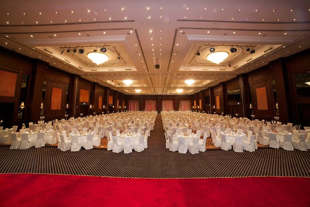 Grand Cevahir Hotel auditorium with banquet seating for formal gala or awards event.