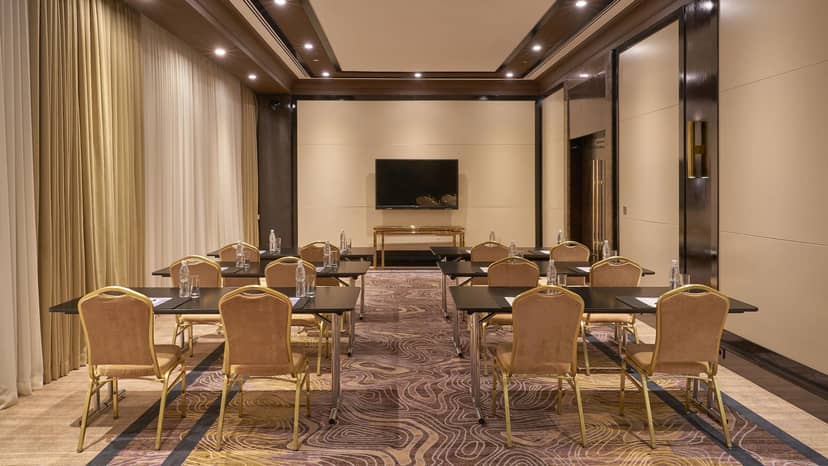 Archerson boardroom with 12 seats, professional meeting room for corporate events and conferences.