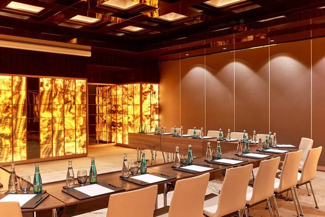 Astor Ballroom boardroom with onyx panels for executive strategy sessions and business meetings.