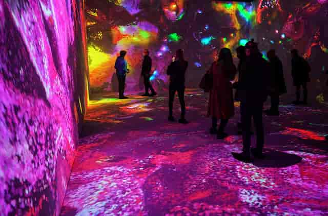 Immersive 360-degree projection mapping installation for experiential event and gallery space.