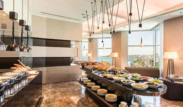 Executive Lounge meeting room with buffet at The Stay Bosphorus for upscale corporate events.